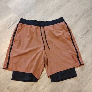 Vuori Rust Orange and Black 2-in-1 Athletic Shorts